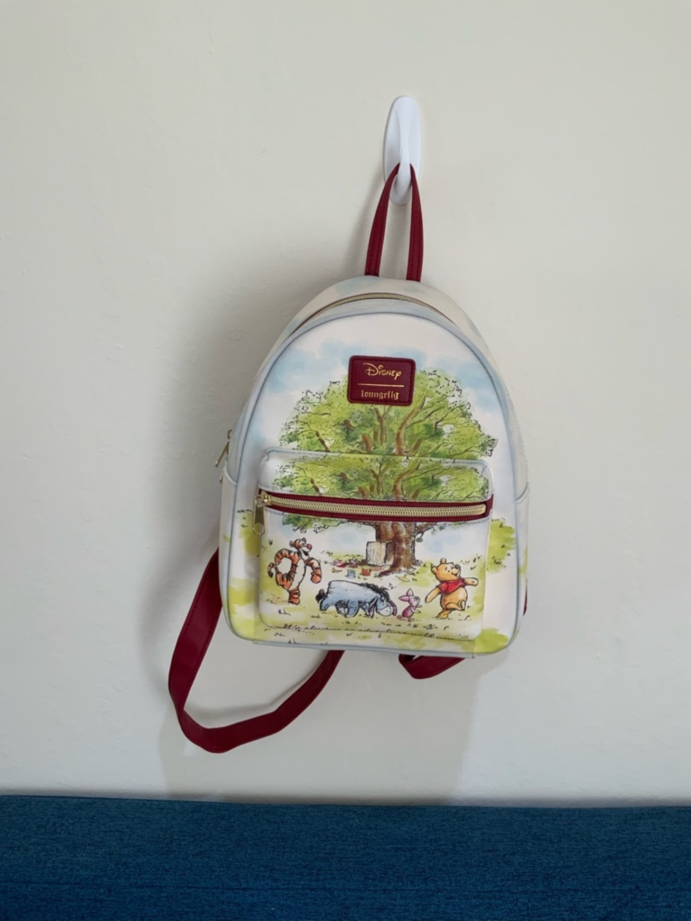 Loungefly White Mini Backpack with Red Straps and Winnie the Pooh Scene